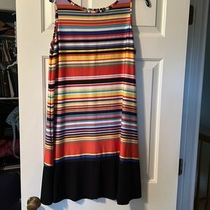 Sorry I cut the tag out. Multi colored striped dress with a black border.